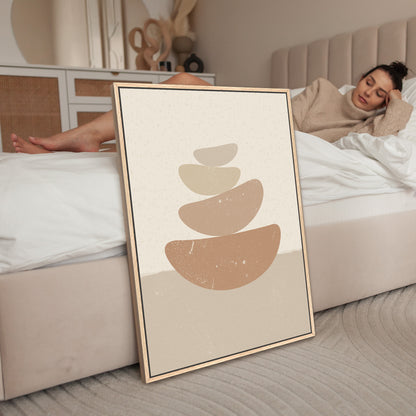 a woman laying on a bed next to a poster